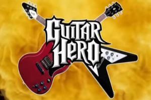 Guitar hero logo with two overlapping guitars 