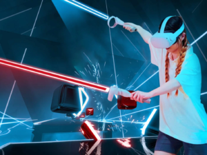 Young woman wearing VR headset and holding two controllers playing Beat Saber game