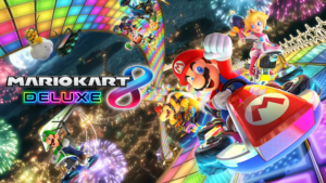 Background of video game with Mario raising his fist and the words Mario Kart 8 Deluxe superimposed on top